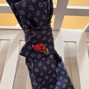 Geoffrey Beene Navy Tie with Red Floral Pattern with red hat brooch